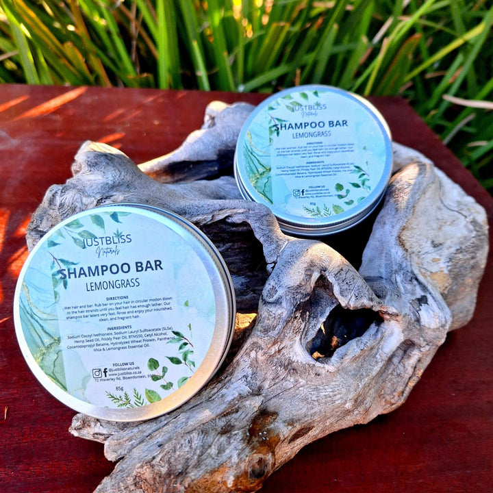Eco-friendly Lemongrass Shampoo Bar in reusable tin ideal for all hair types; plant-based cleansing, hydration, and strength.