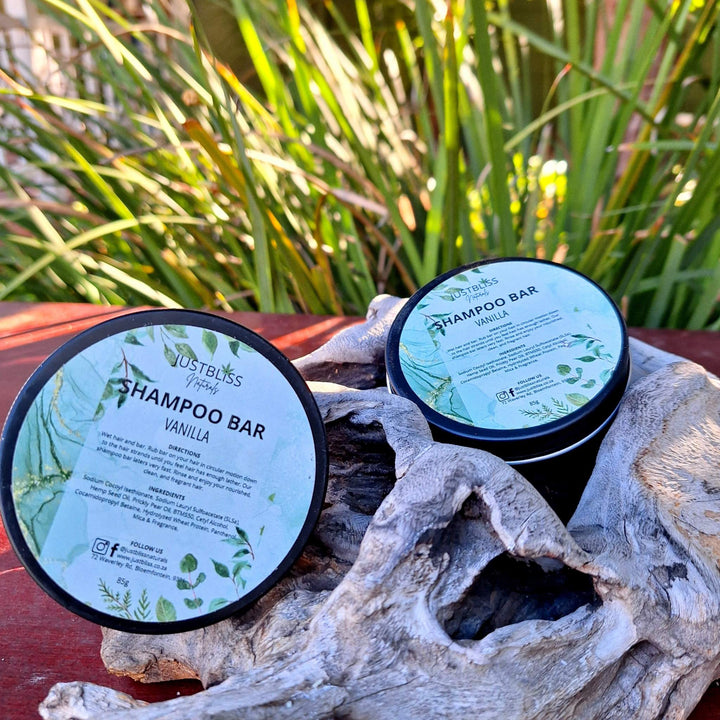 Eco-friendly Shampoo Bar in reusable tins for all hair types, featuring Vanilla scent and hydrating plant-based ingredients. Ideal for sustainable hair care.