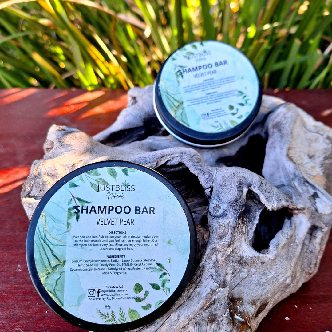 Eco-friendly Shampoo Bar in reusable tins, featuring plant-based ingredients like Hemp Seed Oil and Prickly Pear Oil for all hair types. Perfect for travel.