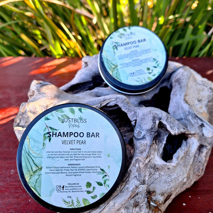 Eco-friendly Shampoo Bar in reusable tins, featuring plant-based ingredients like Hemp Seed Oil and Prickly Pear Oil for all hair types. Perfect for travel.