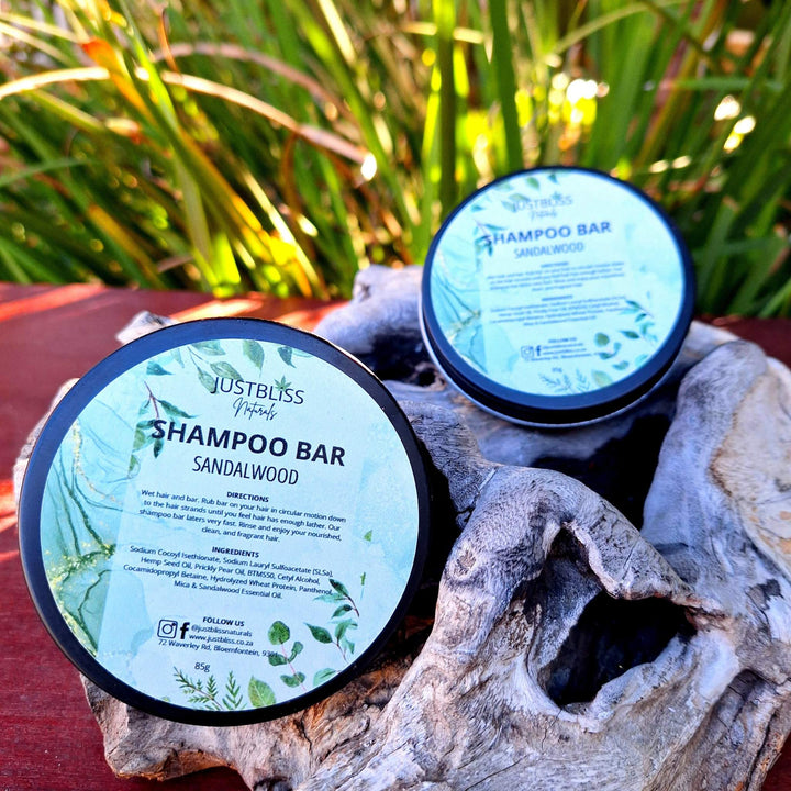 Eco-friendly Shampoo Bar in a reusable tin, crafted with plant-based ingredients like hemp seed and prickly pear oil, ideal for all hair types.