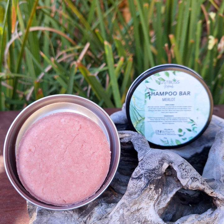 Eco-friendly Shampoo Bar in reusable tin, made with natural plant-based ingredients for effective hair care.
