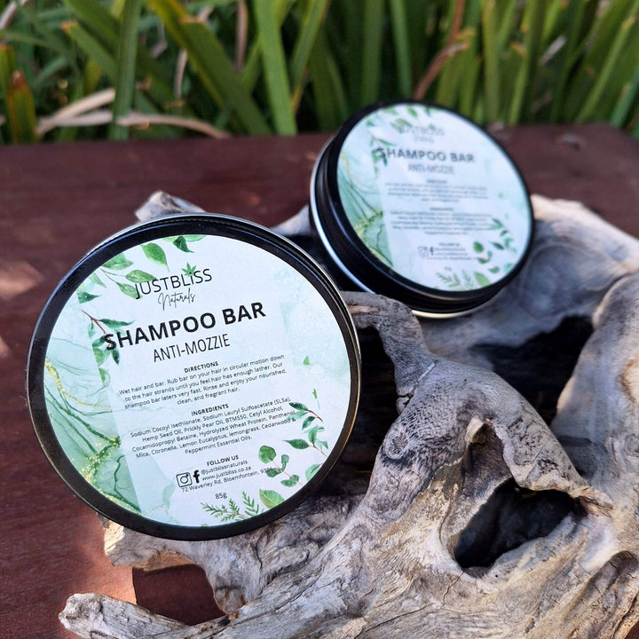 Eco-friendly Shampoo Bar in reusable tins, ideal for sustainable hair care.