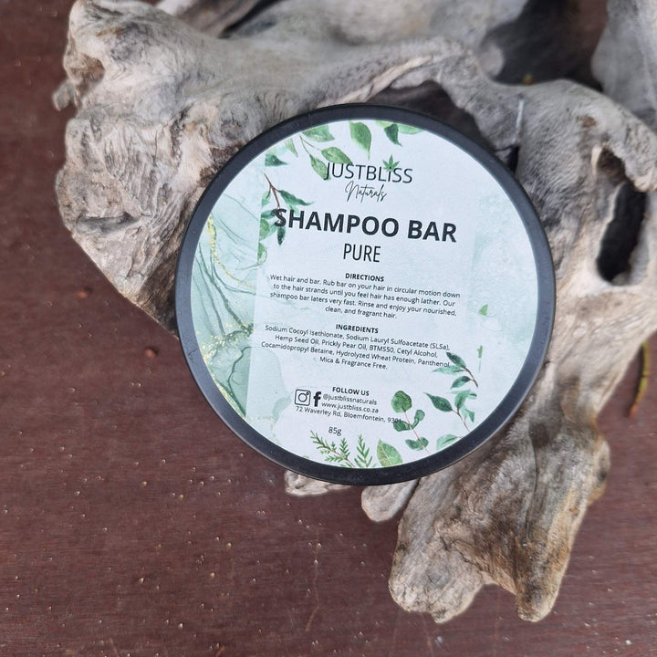 Eco-friendly Shampoo Bar in a reusable tin with natural ingredients for all hair types.