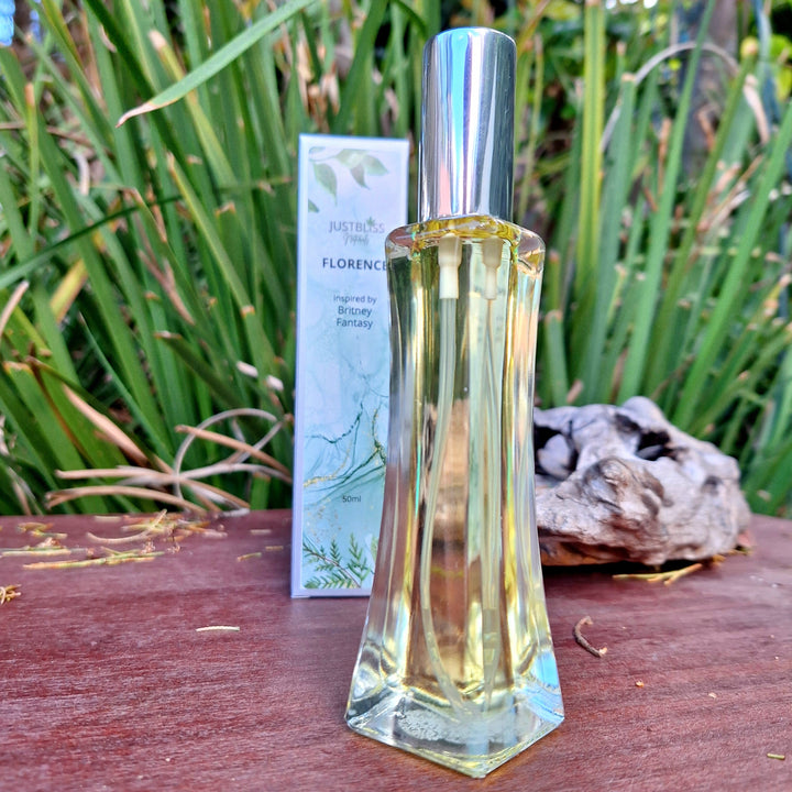 50ml oil-based floral perfume for women, featuring fruity and floral notes with vanilla undertones. Ideal for elegance and sophistication.