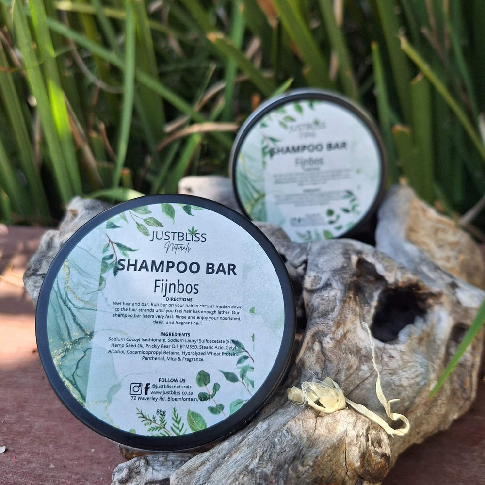 Eco-friendly Shampoo Bar in reusable tins, enriched with plant-based ingredients for all hair types.