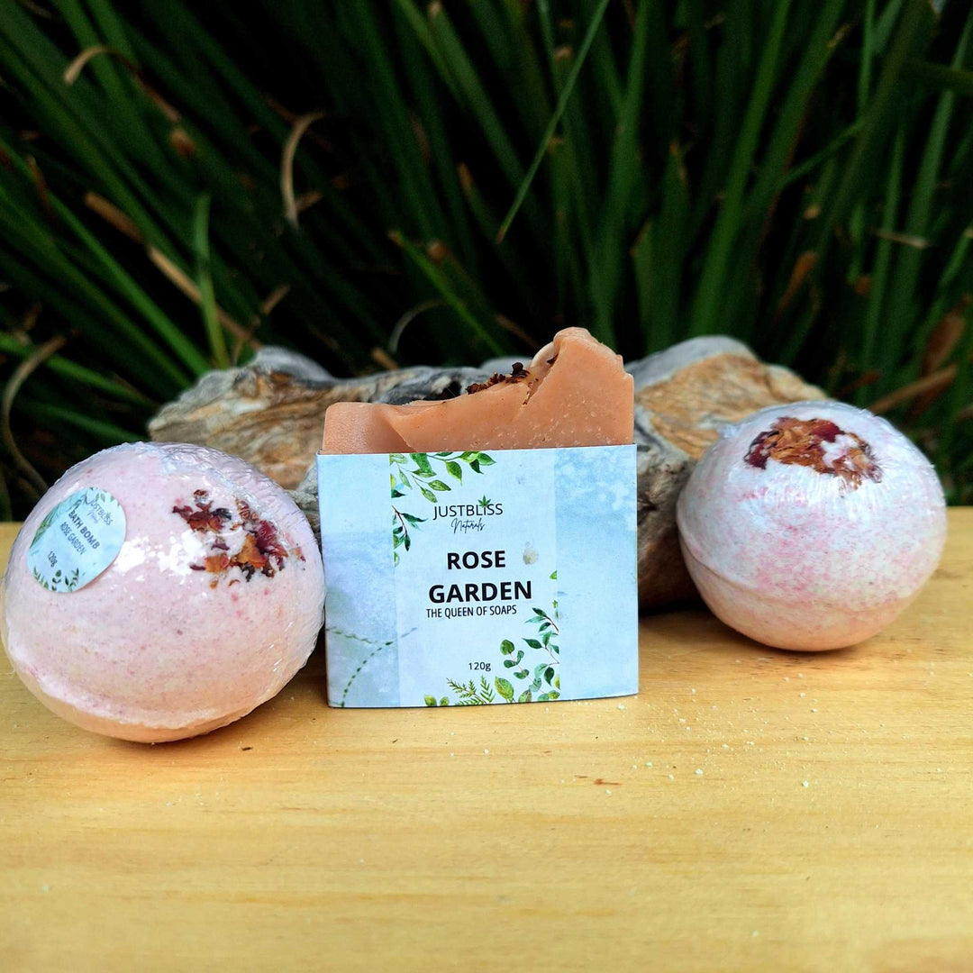 Artisan Luxury Bath Set - Soap Bar and 2 Bath Bombs combo on a wooden surface, featuring "Rose Garden" packaging.