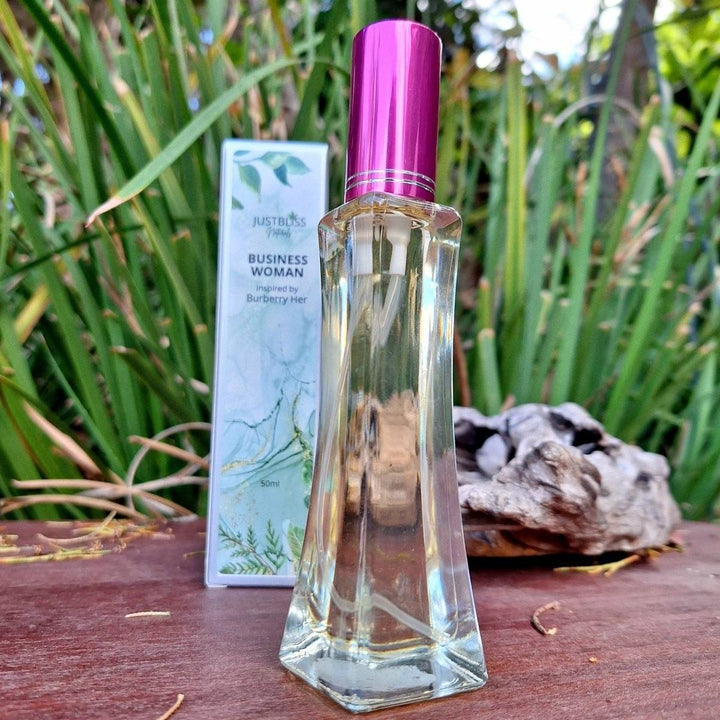 combo Floral Perfume & Whipped body butter: for business women, featuring a perfume bottle with pink cap and matching box against a natural backdrop.