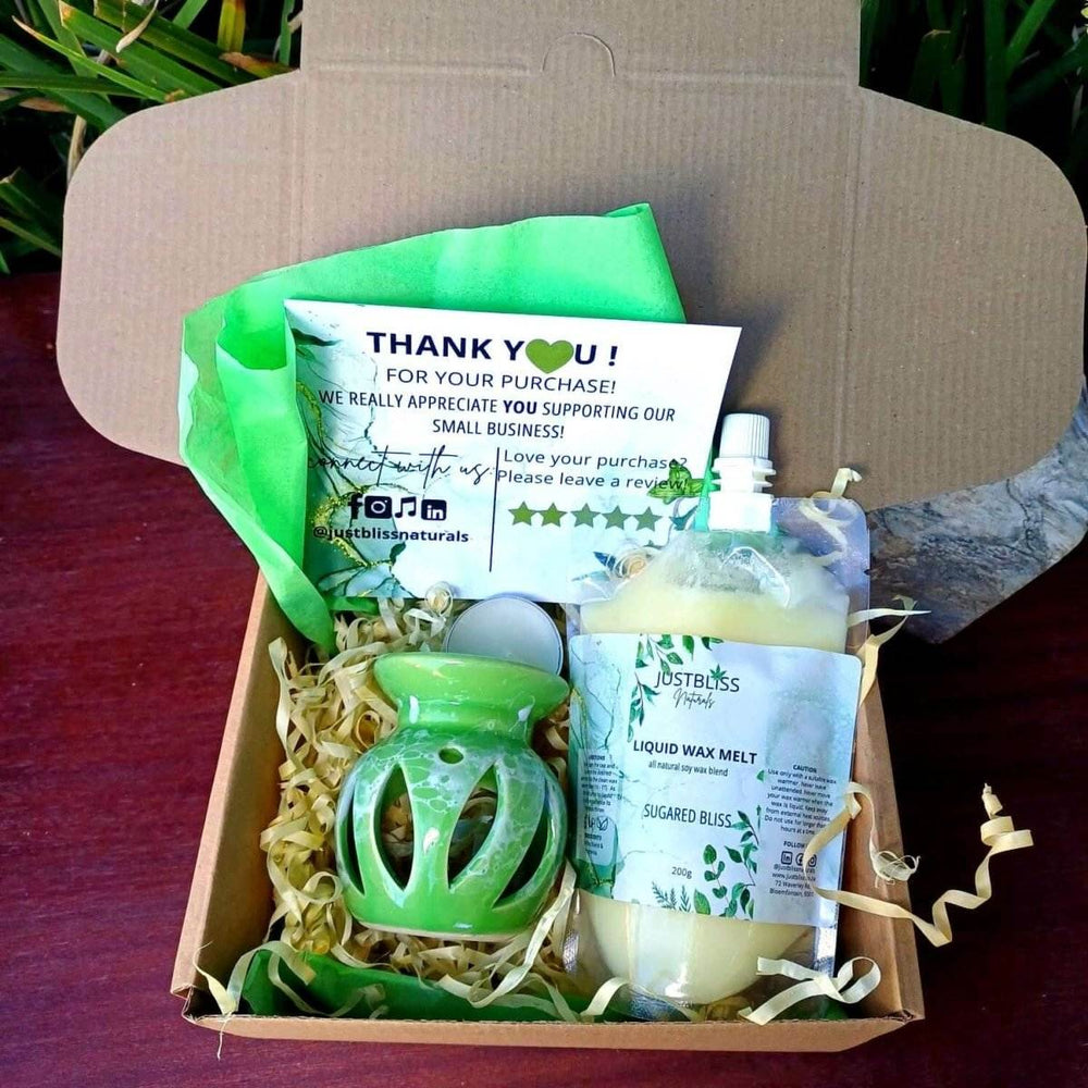Aromatherapy Gift Box 2 with candle, stylish burner, and Liquid Wax Melt for soothing ambiance.