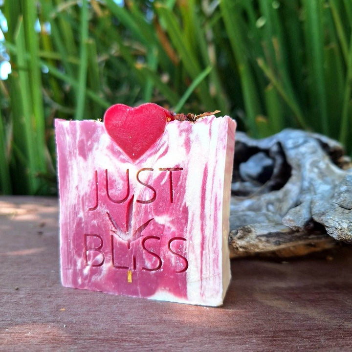 Romantic Rose Garden Gift Box with body scrub, body butter, soap bar, and bath bomb, infused with geranium fragrance.