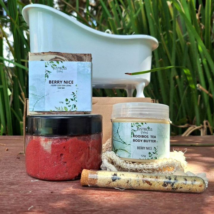 Limited edition spa gift box with bath essentials including body scrub, bath salt, artisan soap, and body butter.