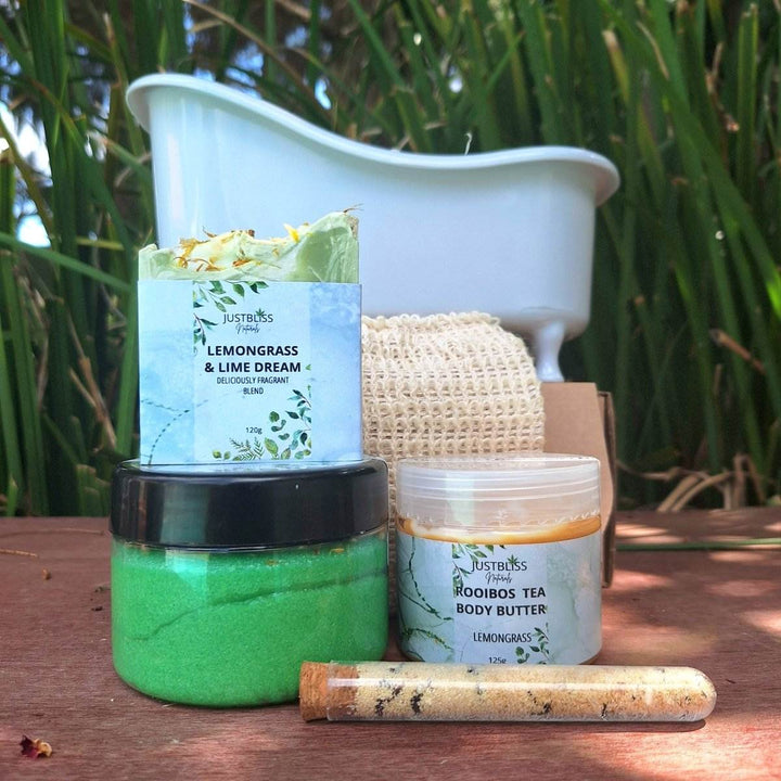 GIFT BOX: Spa in a Bath set with body scrub, bath salt, artisan soap, sisal soap saver, rooibos tea body butter, and small bath, featuring Lemongrass scent.