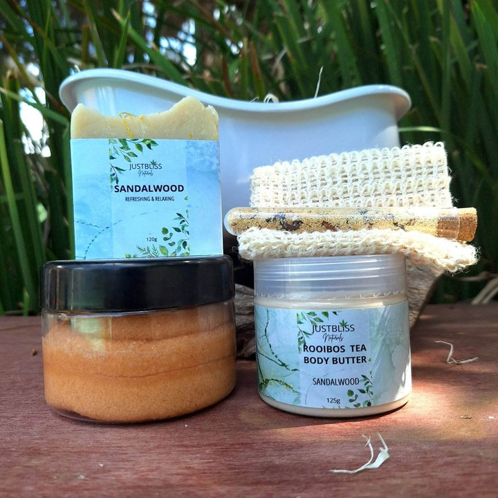 GIFT BOX: Spa in a Bath set with body scrub, bath salt, artisan soap, sisal soap saver, and rooibos tea body butter in sandalwood scent.
