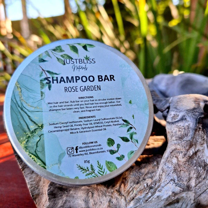 Eco-friendly Shampoo Bar in reusable tin, formulated with plant-based ingredients like Hemp Seed Oil and Prickly Pear Oil for cleansing and hydration; suitable for all hair types.