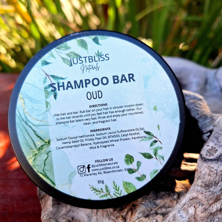 Eco-friendly Oud Shampoo Bar in reusable tin, promotes healthy hair with plant-based ingredients. Ideal for travel and sustainable hair care.