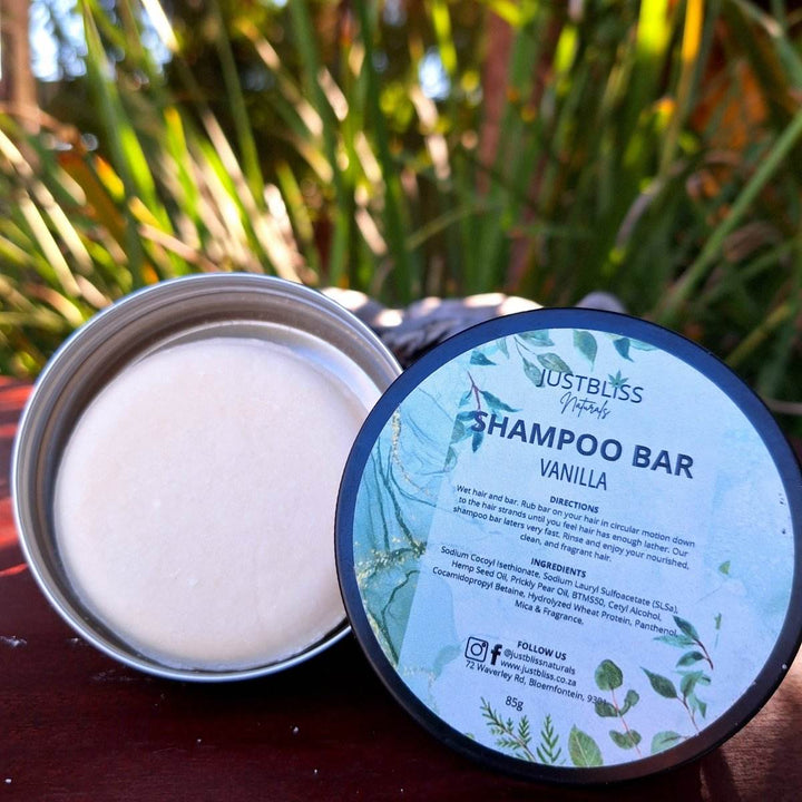 Eco-friendly vanilla Shampoo Bar in reusable tin for all hair types, crafted with natural ingredients for cleansing and hydration.