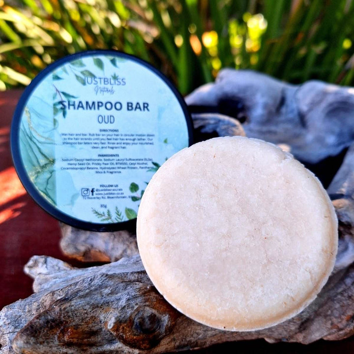 Eco-friendly Shampoo Bar in tin for all hair types, featuring Oud, enhances shine and repairs hair with plant-based ingredients.