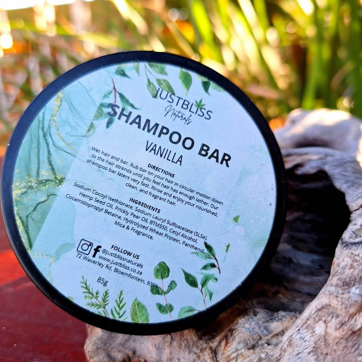 Eco-friendly Shampoo Bar in reusable tin, crafted with plant-based ingredients for all hair types.