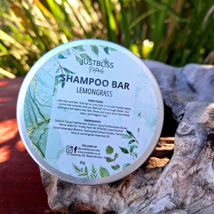 Eco-friendly Shampoo Bar in reusable tin with plant-based ingredients for all hair types.