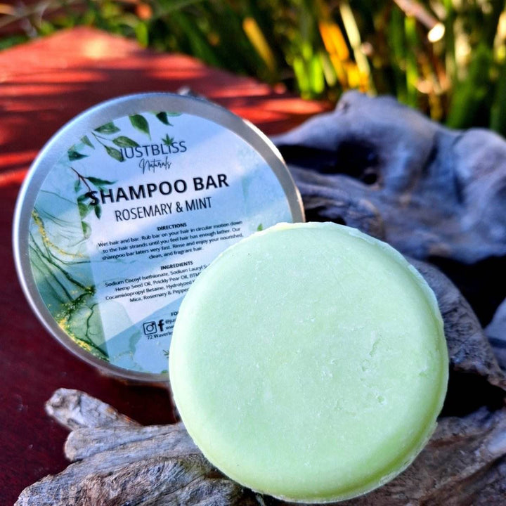 Eco-friendly rosemary and mint Shampoo Bar in reusable tin for all hair types.