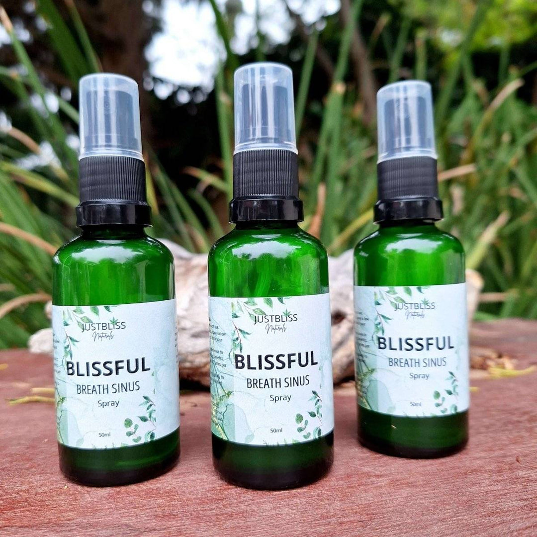 Blissful Breathe Sinus Relief Spray bottles for effective sinus relief placed outdoors.