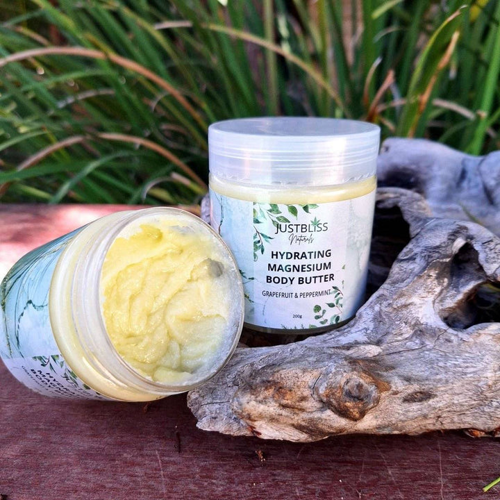 Magnesium Whipped Body Butter in jar, open with creamy texture, perfect for extremely hydrating dry skin.