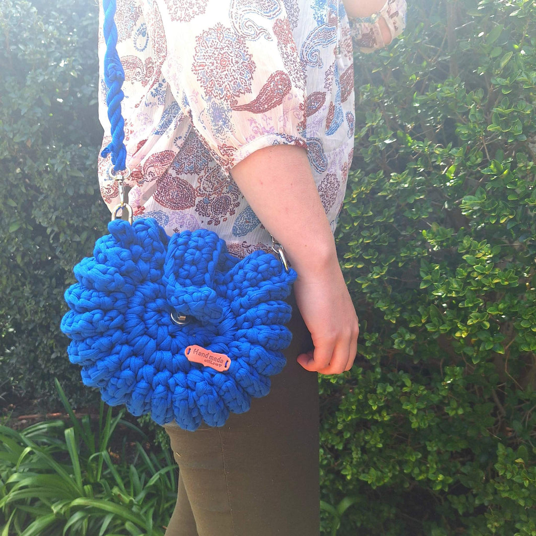 Handcrafted handbag with unique design, handmade with cotton wool for natural elegance.