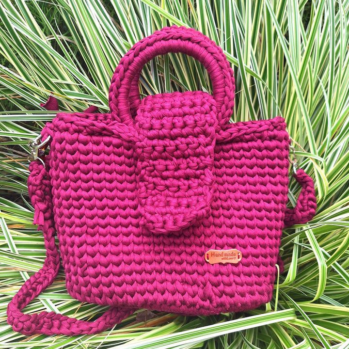 Hand-crafted handbag with unique design, perfect for makeup and essentials.
