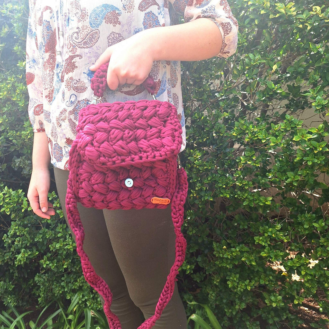 Handcrafted handbag made of cotton wool, unique design.